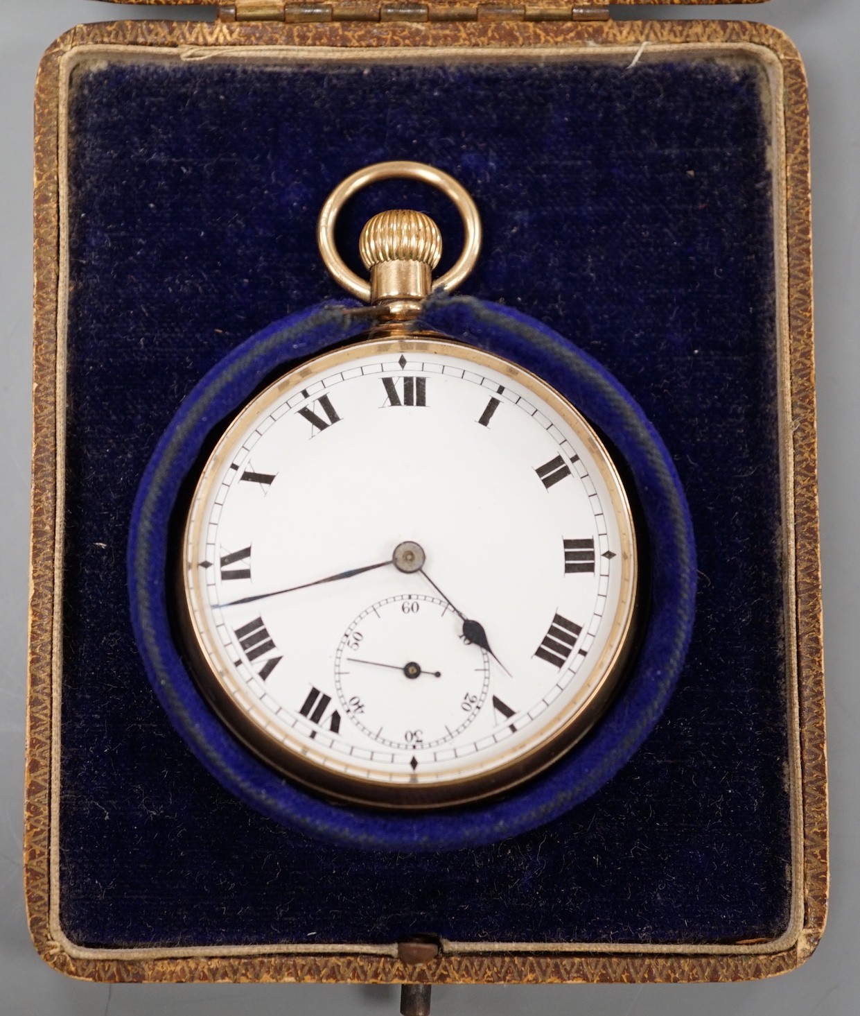 A George V 9ct gold open faced gold pocket watch with Roman dial and subsidiary seconds, the inner case with engraved inscription, case diameter 47mm, gross weight 76.9 grams, in fitted case.